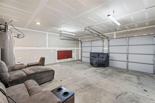165 Twin Lakes Dr, Covington, GA 30016 - garage featuring electric water heater