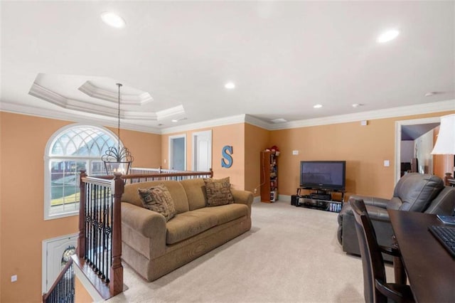 living area featuring light carpet, crown molding, recessed lighting, and a raised ceiling