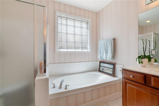 6355 Marlow Dr, Cumming, GA 30041 - full bathroom with a bath, wallpapered walls, and a stall shower