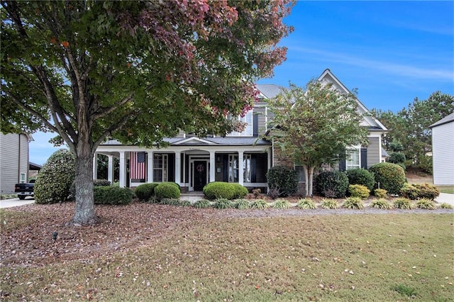 view of front of home with a front yard