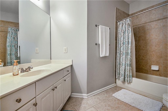 full bathroom with vanity, shower / bath combination with curtain, toilet, and tile patterned flooring