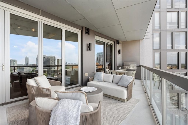 balcony featuring a grill and a view of city