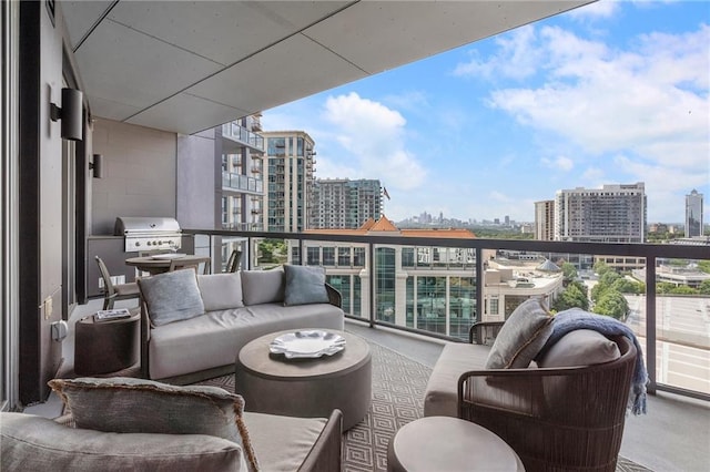 balcony featuring an outdoor living space, a view of city, and grilling area