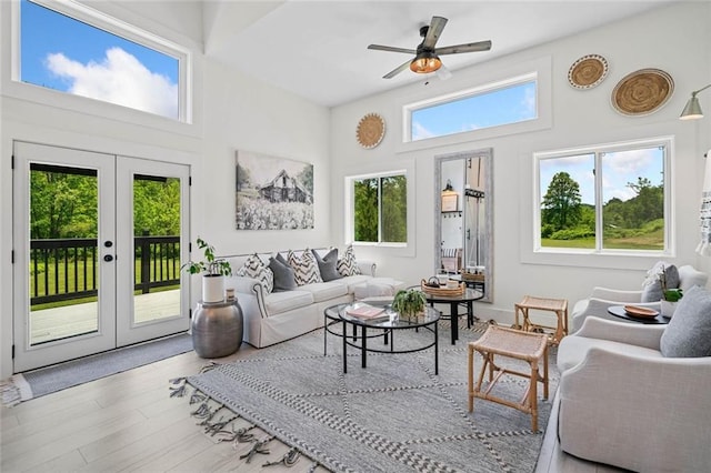 4791 Talona Rd, Talking Rock, GA 30175 - living room with french doors, wood finished floors, ceiling fan, and a high ceiling