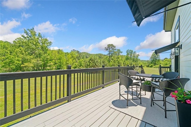 4791 Talona Rd, Talking Rock, GA 30175 - wooden deck with a lawn, outdoor dining area, and a view of trees
