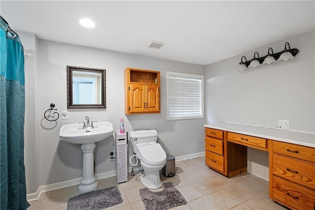 5971 Dogwood Dr SE, Acworth, GA 30102 - bathroom with toilet, tile patterned floors, baseboards, recessed lighting, and a shower with shower curtain