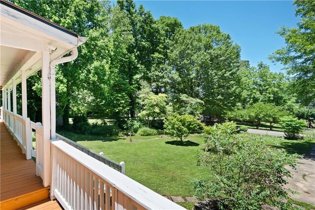 5971 Dogwood Dr SE, Acworth, GA 30102 - view of green lawn with view of wooded area