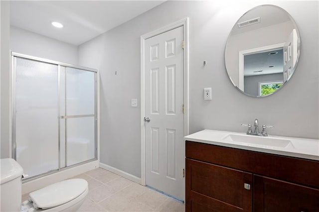5971 Dogwood Dr SE, Acworth, GA 30102 - bathroom with toilet, vanity, a stall shower, baseboards, and tile patterned flooring