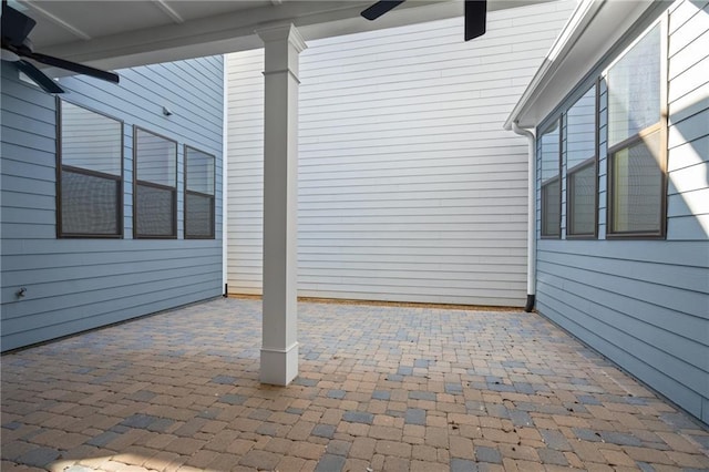 view of patio / terrace featuring ceiling fan