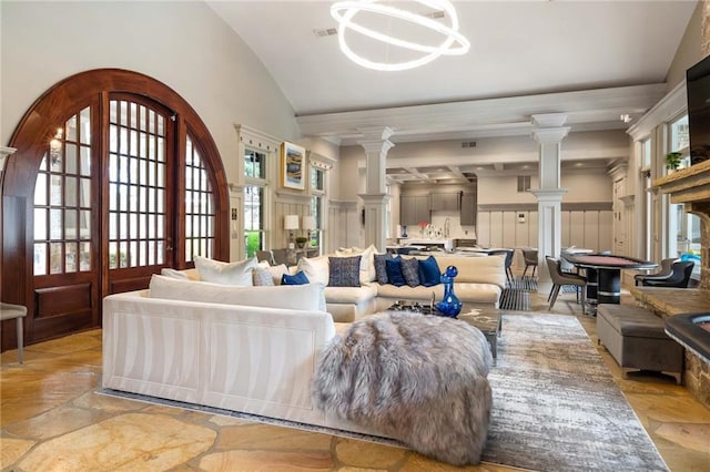 living room featuring lofted ceiling