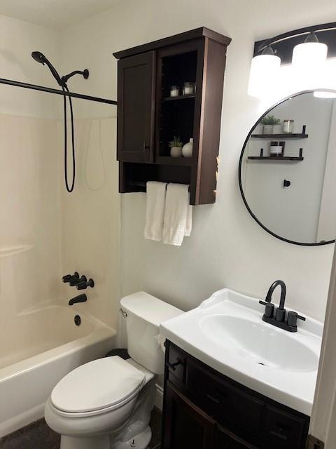 full bathroom with vanity, bathtub / shower combination, and toilet