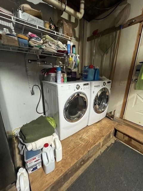 laundry room featuring separate washer and dryer