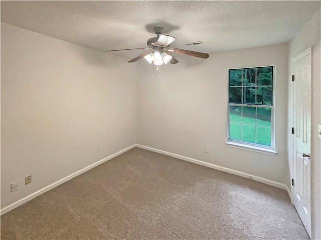 46 Timber Walk Dr, Sharpsburg, GA 30277 - unfurnished room featuring a textured ceiling, ceiling fan, and carpet floors