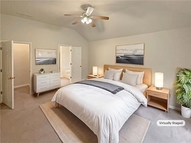 46 Timber Walk Dr, Sharpsburg, GA 30277 - bedroom featuring light colored carpet, vaulted ceiling, a ceiling fan, and connected bathroom