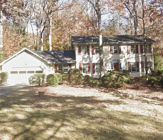 colonial home featuring a garage