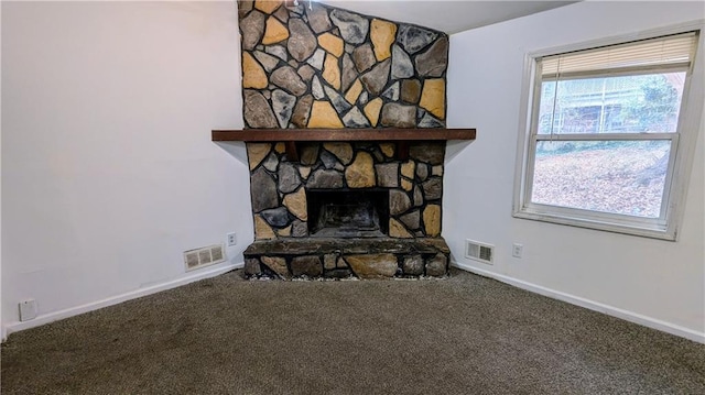 details with a fireplace and carpet floors