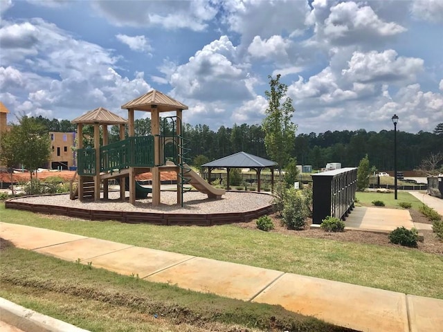 view of jungle gym with a gazebo and a lawn