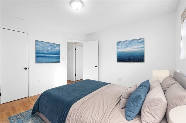 bedroom featuring wood finished floors