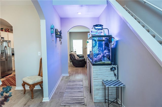 hallway featuring light hardwood / wood-style flooring