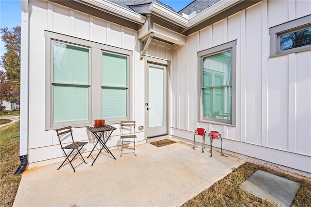 entrance to property with a patio area