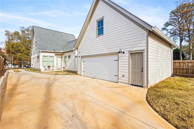 view of side of property with a lawn