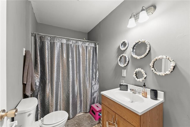 4010 Catawba Rdg, Gainesville, GA 30506 - bathroom with vanity, a shower with shower curtain, and toilet