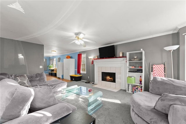 4010 Catawba Rdg, Gainesville, GA 30506 - living room featuring carpet, a tile fireplace, crown molding, and ceiling fan