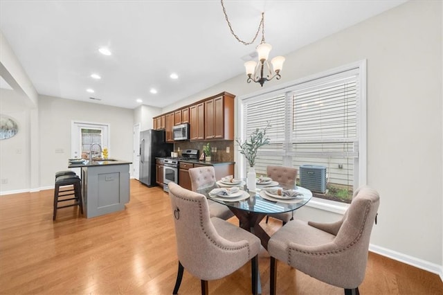3607 Archgate Ct, Alpharetta, GA 30004 - dining room featuring a chandelier, light wood-type flooring, baseboards, and recessed lighting