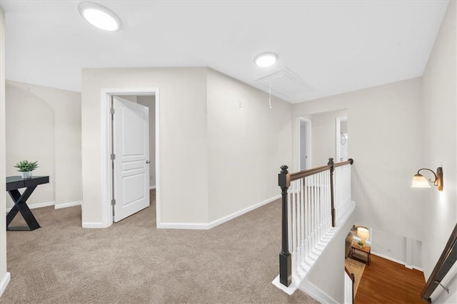 3607 Archgate Ct, Alpharetta, GA 30004 - hall with attic access, an upstairs landing, baseboards, and carpet floors