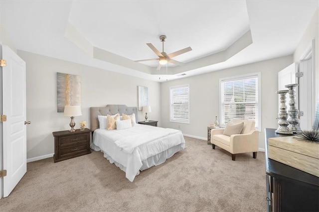 3607 Archgate Ct, Alpharetta, GA 30004 - bedroom with a tray ceiling, light carpet, baseboards, and multiple windows
