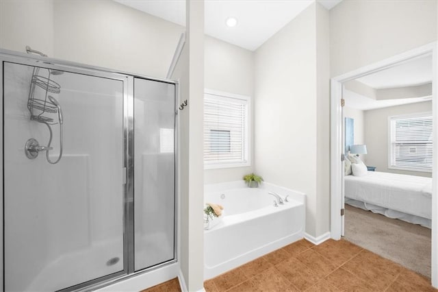 3607 Archgate Ct, Alpharetta, GA 30004 - ensuite bathroom with a stall shower, a bath, and baseboards