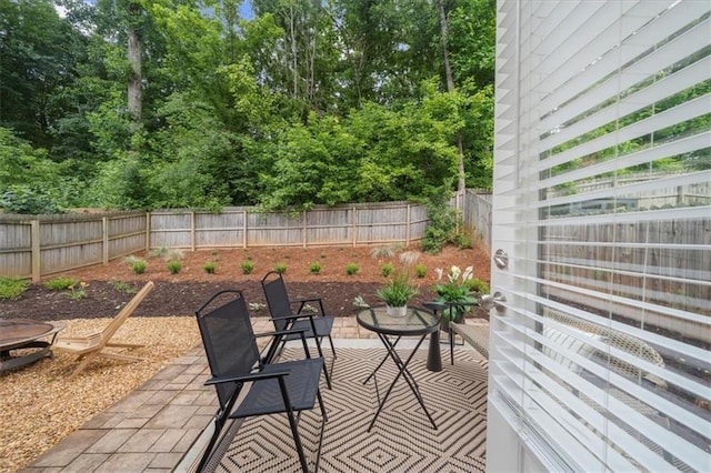 3607 Archgate Ct, Alpharetta, GA 30004 - fenced backyard with a patio and view of wooded area