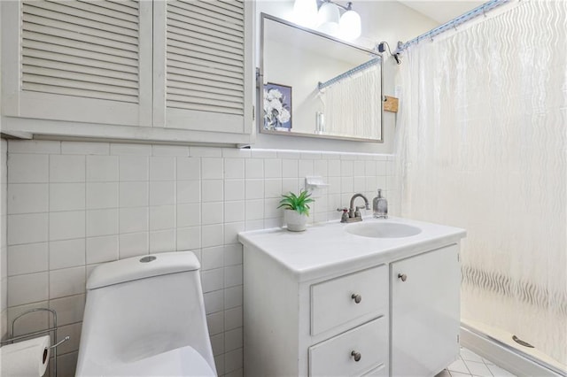 bathroom featuring vanity, tile walls, and a shower with shower curtain