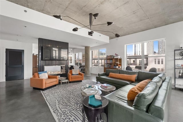 living room featuring an inviting chandelier