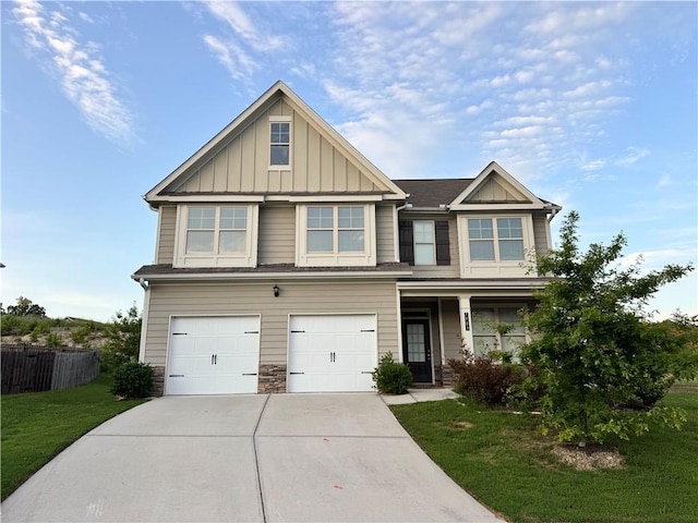 7703 Hansel Ln, Lithonia, GA 30058 - craftsman house featuring board and batten siding, concrete driveway, an attached garage, covered porch, and stone siding