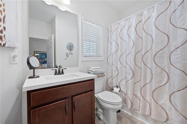 full bathroom with toilet, vanity, and shower / bathtub combination with curtain