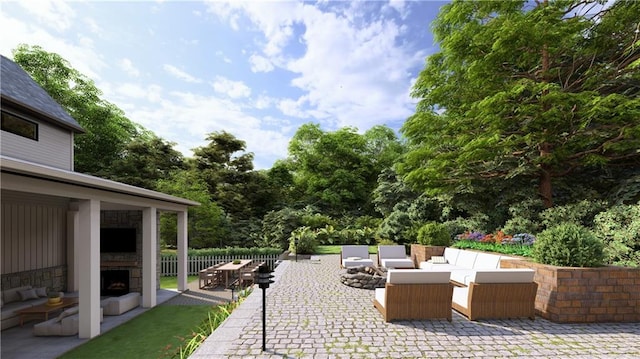 view of patio with an outdoor living space with a fireplace