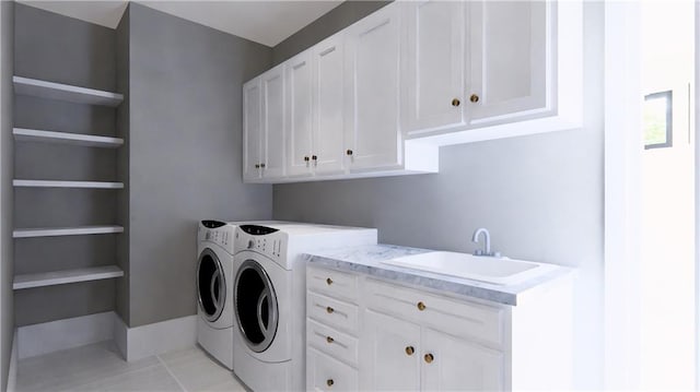 laundry area with washing machine and dryer, light tile patterned flooring, sink, and cabinets