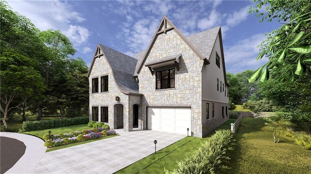 view of front of property with a garage and a front lawn