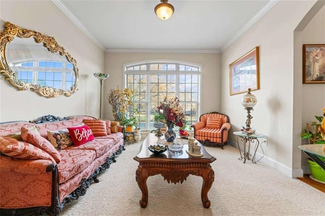 sitting room featuring carpet floors and ornamental molding