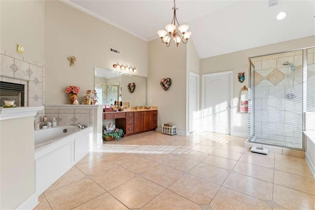 bathroom with tile patterned flooring, high vaulted ceiling, a notable chandelier, crown molding, and vanity