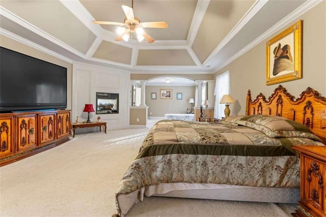 bedroom with coffered ceiling, crown molding, ceiling fan, carpet floors, and decorative columns