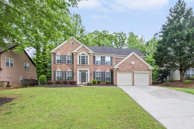 1465 Laleiah Dr, Cumming, GA 30041 - colonial inspired home featuring a garage, a front yard, driveway, and brick siding