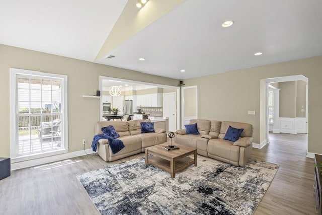 1465 Laleiah Dr, Cumming, GA 30041 - living room with baseboards, recessed lighting, and light wood-style flooring