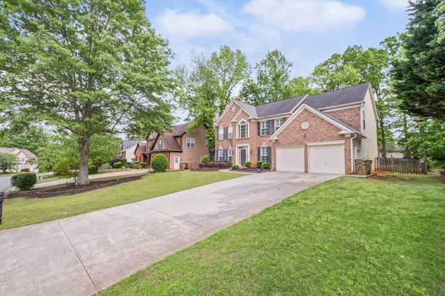 1465 Laleiah Dr, Cumming, GA 30041 - colonial house with a garage, a front lawn, fence, brick siding, and concrete driveway