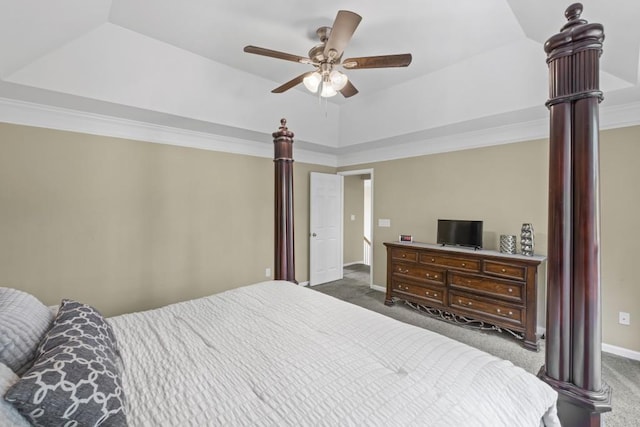 1465 Laleiah Dr, Cumming, GA 30041 - bedroom featuring a ceiling fan, ornamental molding, baseboards, a tray ceiling, and carpet flooring