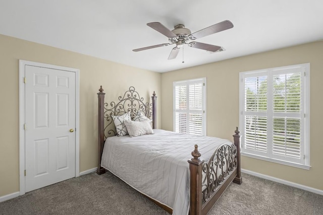 1465 Laleiah Dr, Cumming, GA 30041 - carpeted bedroom with baseboards and a ceiling fan