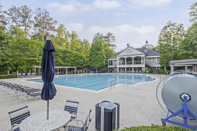 1465 Laleiah Dr, Cumming, GA 30041 - community pool featuring a patio area