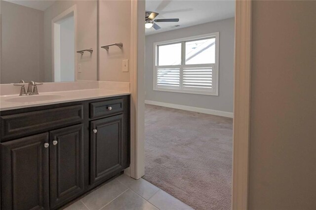 bathroom with vanity, tile patterned floors, and ceiling fan