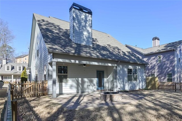 back of house featuring a patio area and ceiling fan